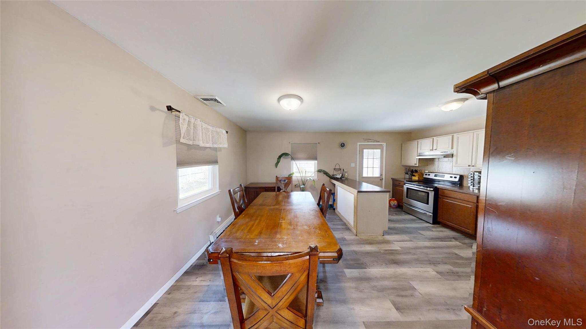 61 Manchester Road Huntington, NY 11743 - Photo 5 of 16 Dining Room with open Kitchen