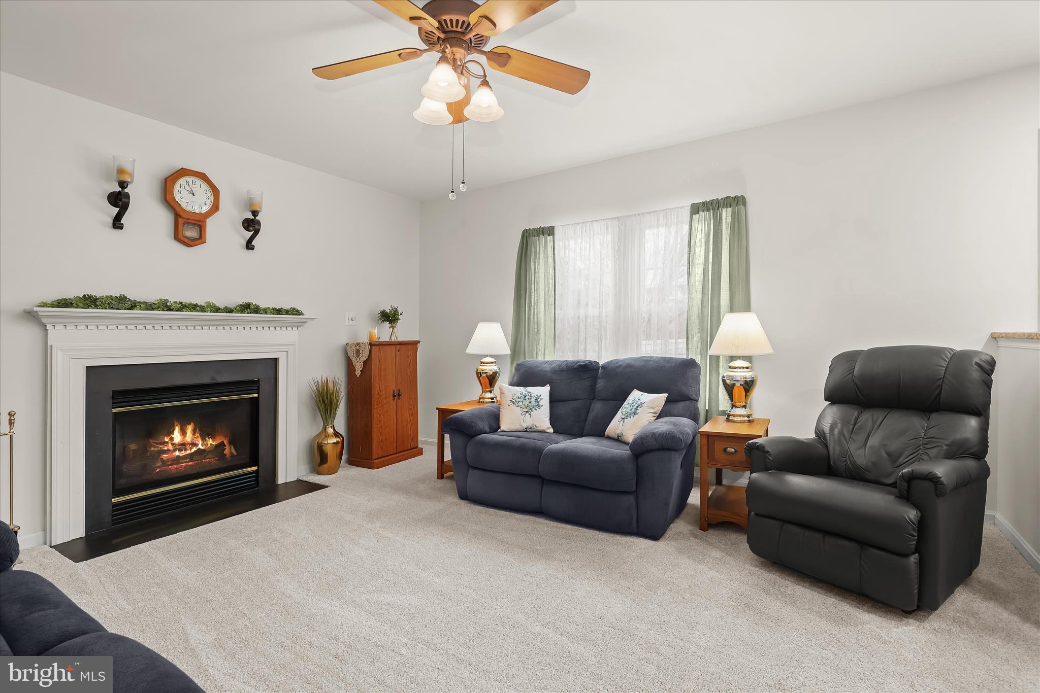 6463 Tydings Road Sykesville, MD 21784 - Photo 24 of 104 a living room with furniture and a fireplace