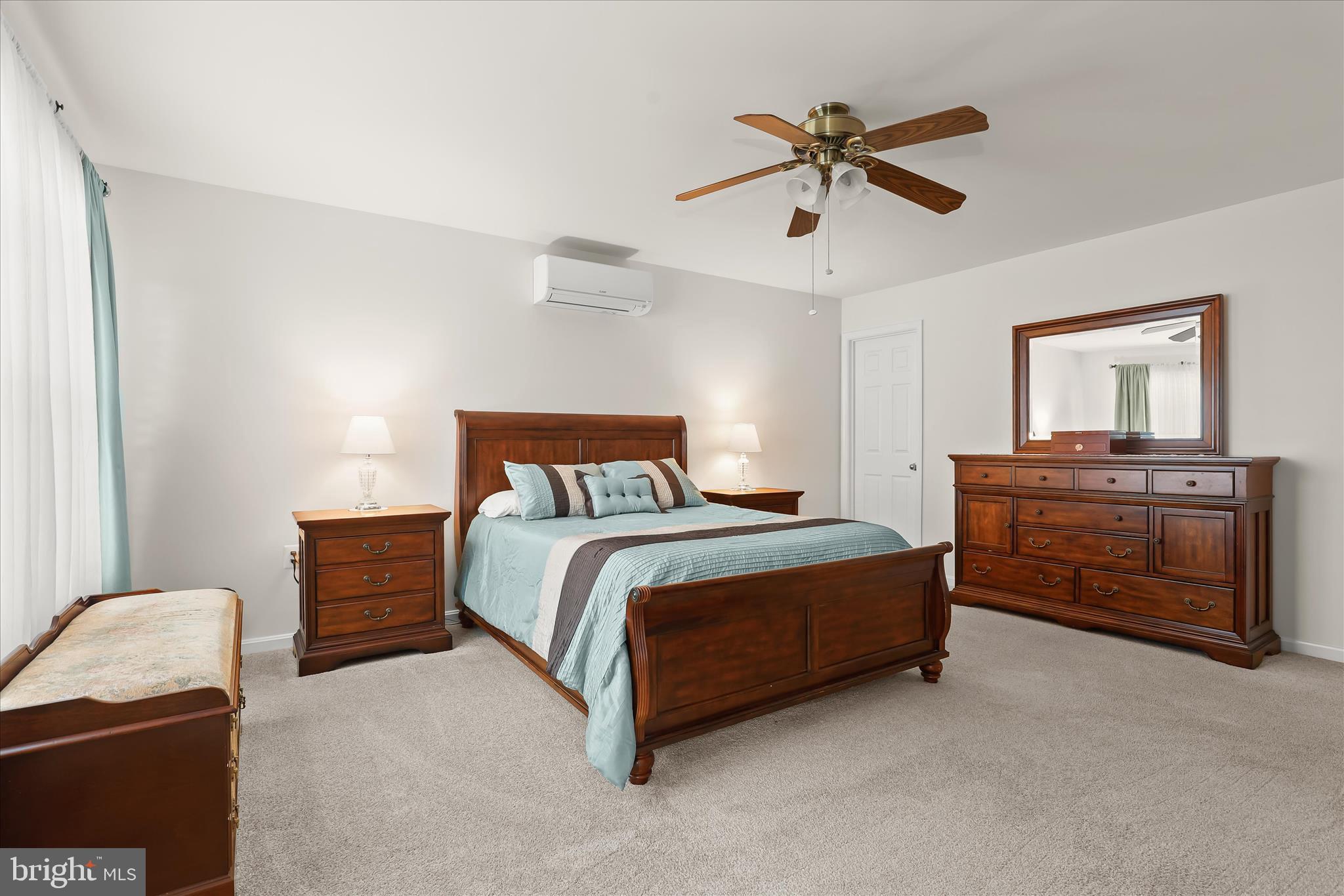 6463 Tydings Road Sykesville, MD 21784 - Photo 5 of 104 a bedroom with a bed and dresser