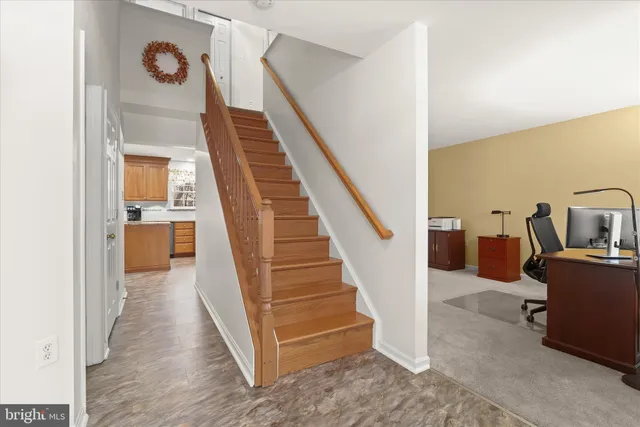 a view of workspace with furniture and window