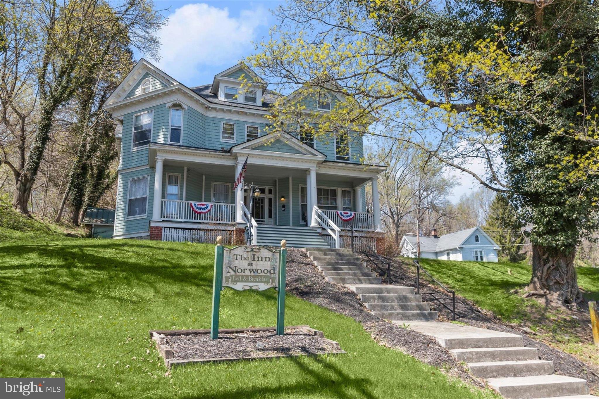 6463 Tydings Road Sykesville, MD 21784 - Photo 89 of 104 a front view of a house with a yard table and chairs