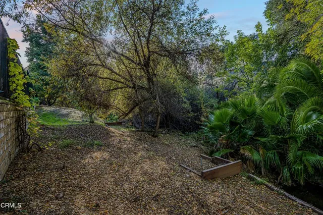 a view of a large body of water with a mountain