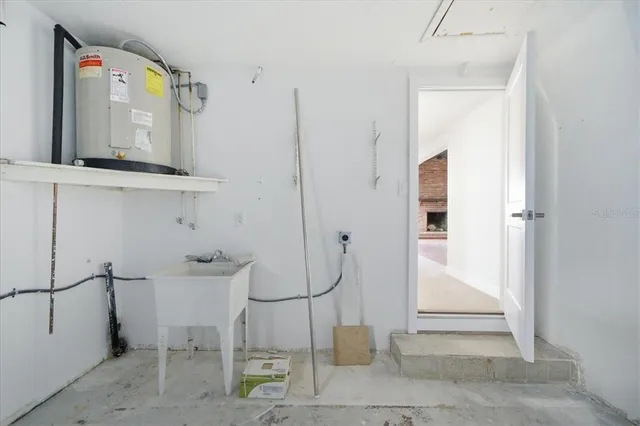 a room with lots of windows and chandelier