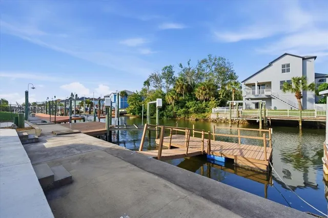 a view of residential houses with lake view