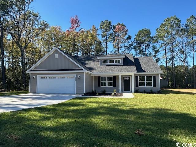 3393 Dusty Road Loris, SC 29569 - Photo 1 of 15 Craftsman-style house featuring a front lawn and a