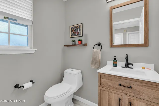 a kitchen with stainless steel appliances granite countertop a stove microwave and sink