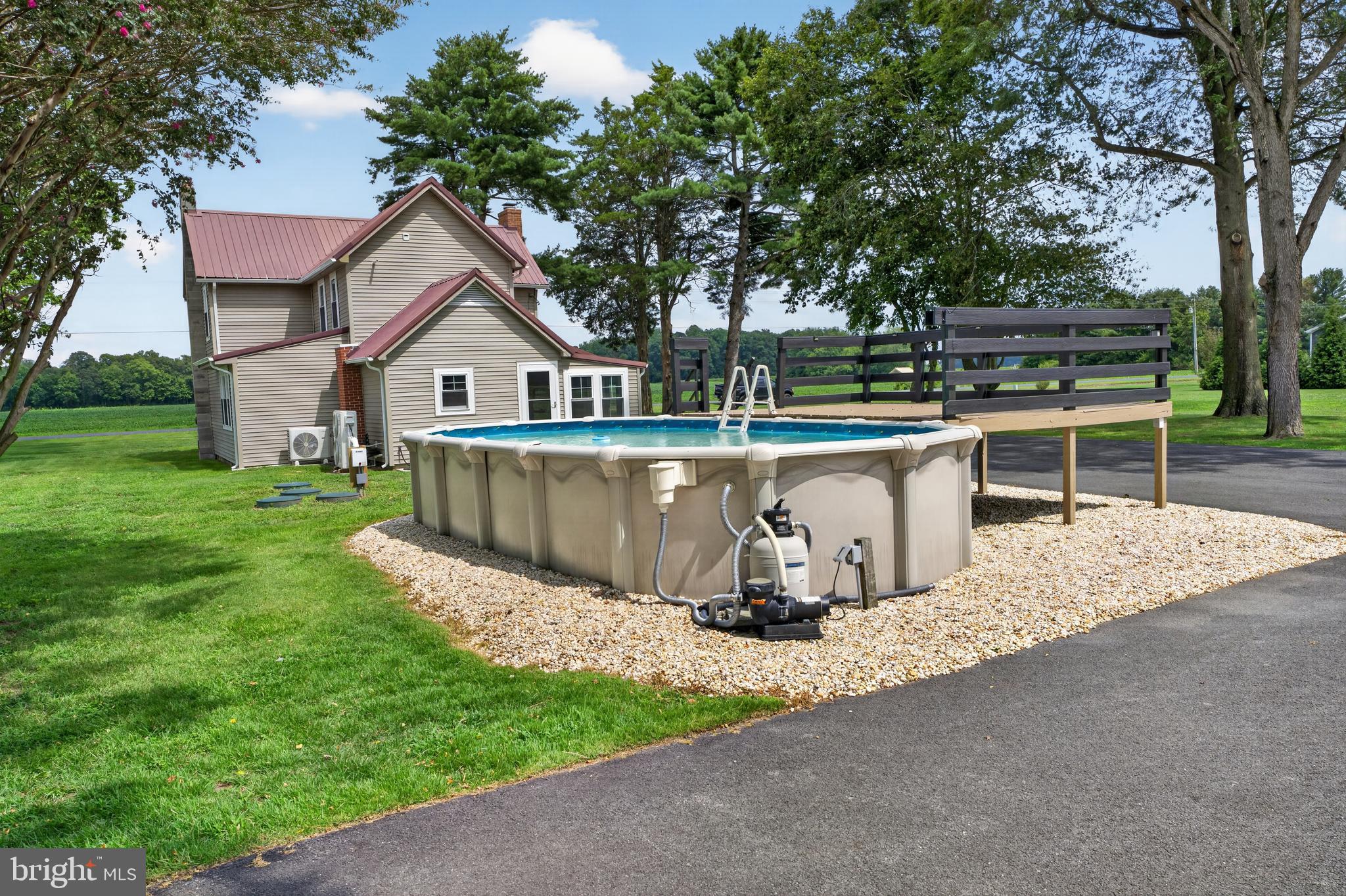 18406 Progress School Road Bridgeville, DE 19933 - Photo 41 of 67 ABOVE GROUND POOL AND REAR