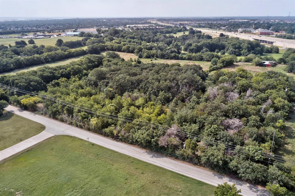 0 Dobbs Road Corinth, TX 76208 - Photo 3 of 16 Expansive treed lot featuring mature foliage and natural landscaping