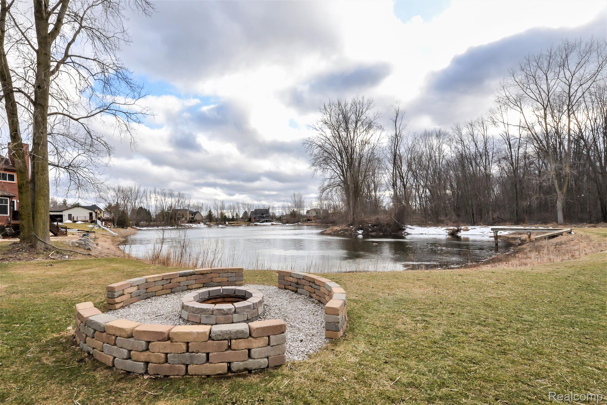 21975 Garfield Road Northville, MI 48167 - Photo 48 of 60 Fire Pit and View of Lake