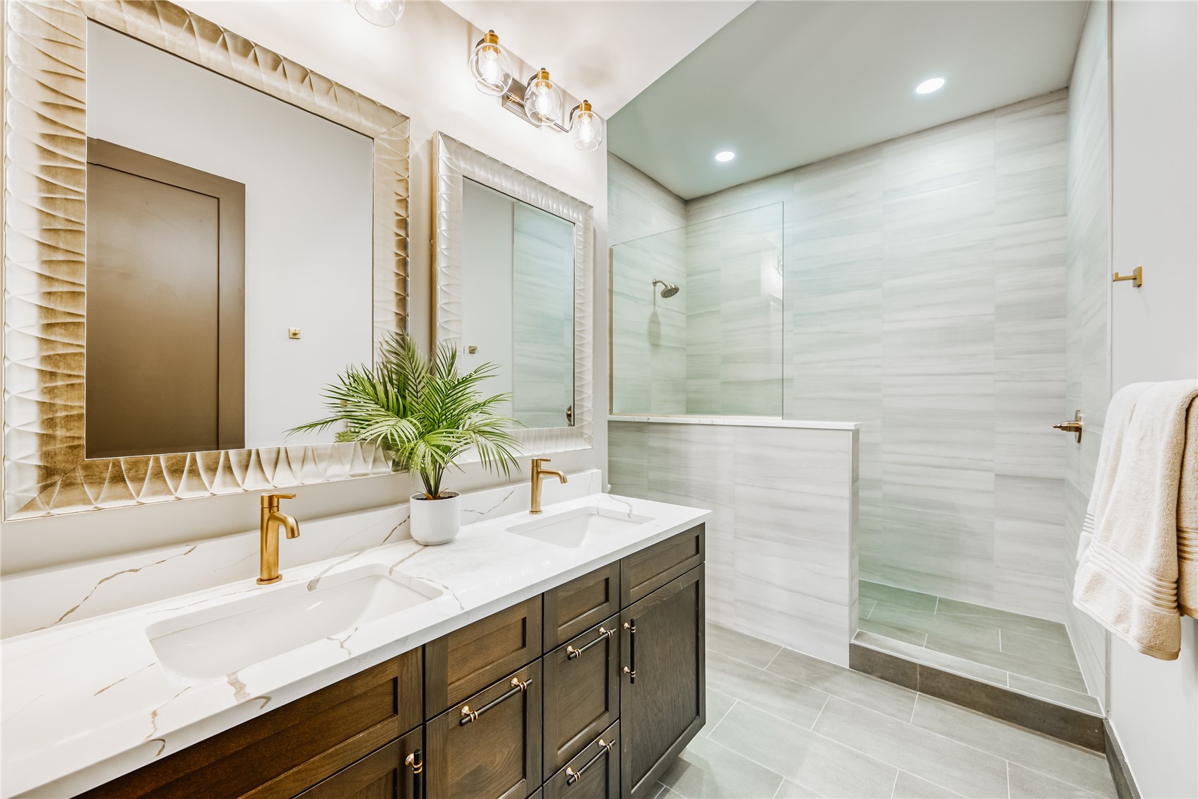 125 Lake Ridge Circle, Unit 1866 Keystone, CO 80435 - Photo 41 of 42 a bathroom with a granite countertop sink and a mirror