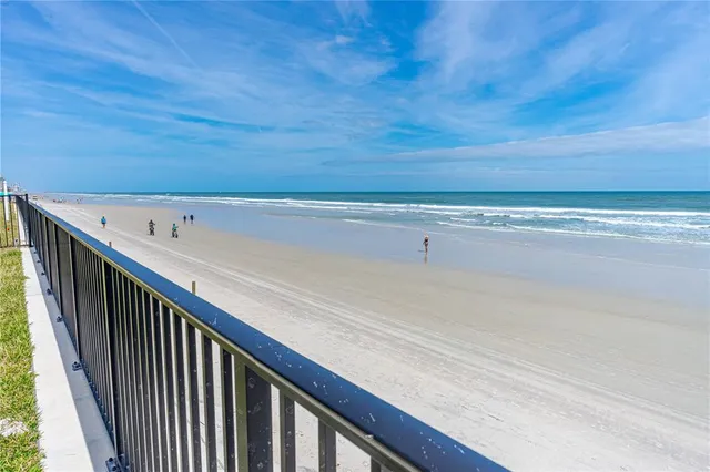 a view of balcony with furniture