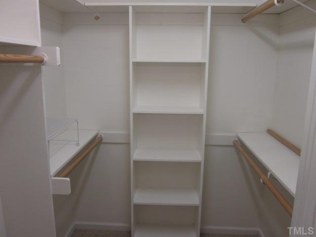 10024 Baileywick Road Raleigh, NC 27613 - Photo 21 of 25 Great master bedroom walk in closet! Lots of shelves and space for two people to share! Located off the master bath!