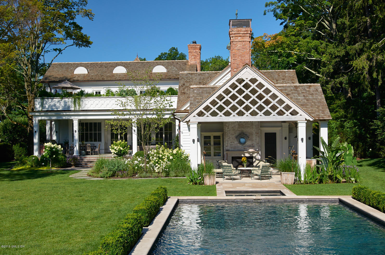 409 Round Hill Road Greenwich, CT 06831 - Photo 16 of 17 a view of a house with sitting area and furniture