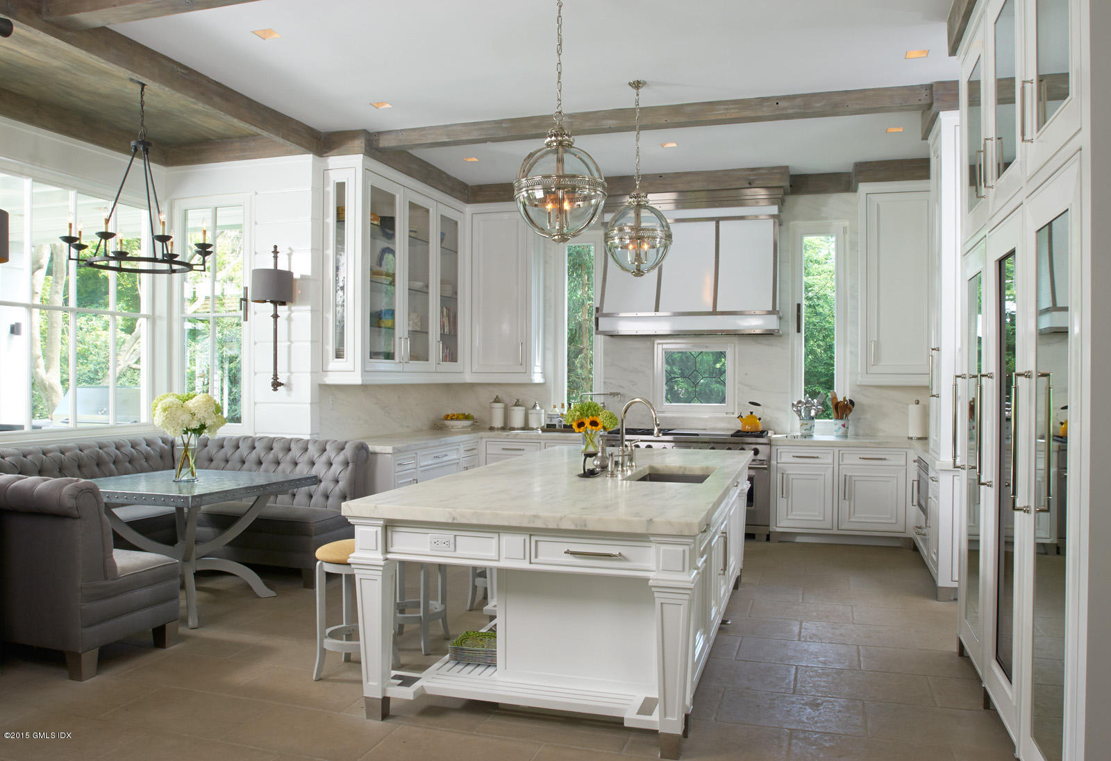 409 Round Hill Road Greenwich, CT 06831 - Photo 7 of 17 a kitchen with a sink stove and refrigerator