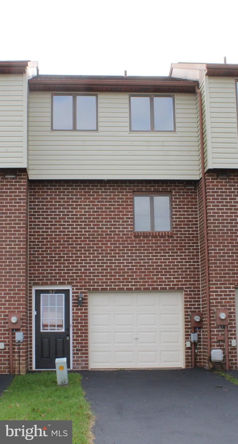 57 Beck Road York, PA 17403 - Photo 1 of 8 a front view of a house with a yard