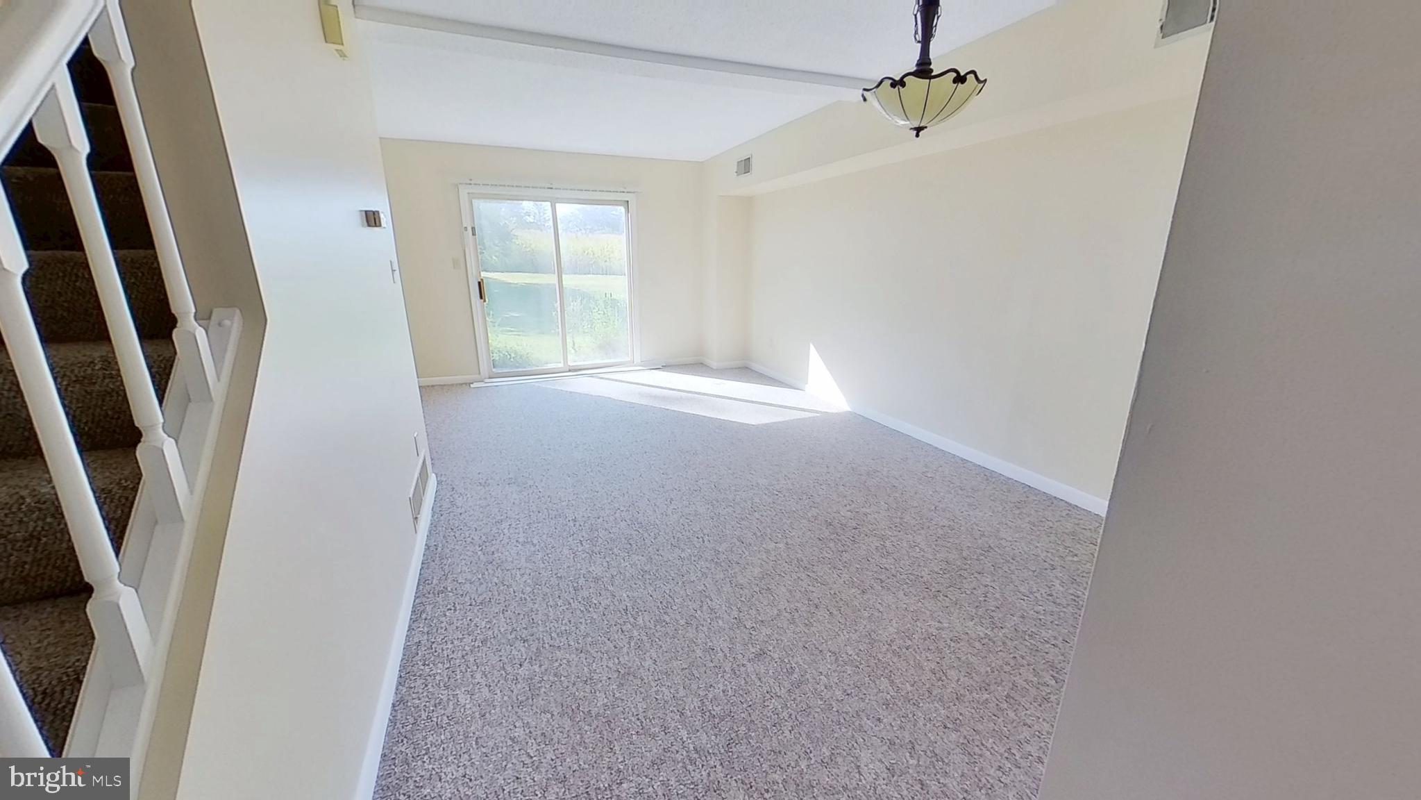 57 Beck Road York, PA 17403 - Photo 3 of 8 an empty room with windows