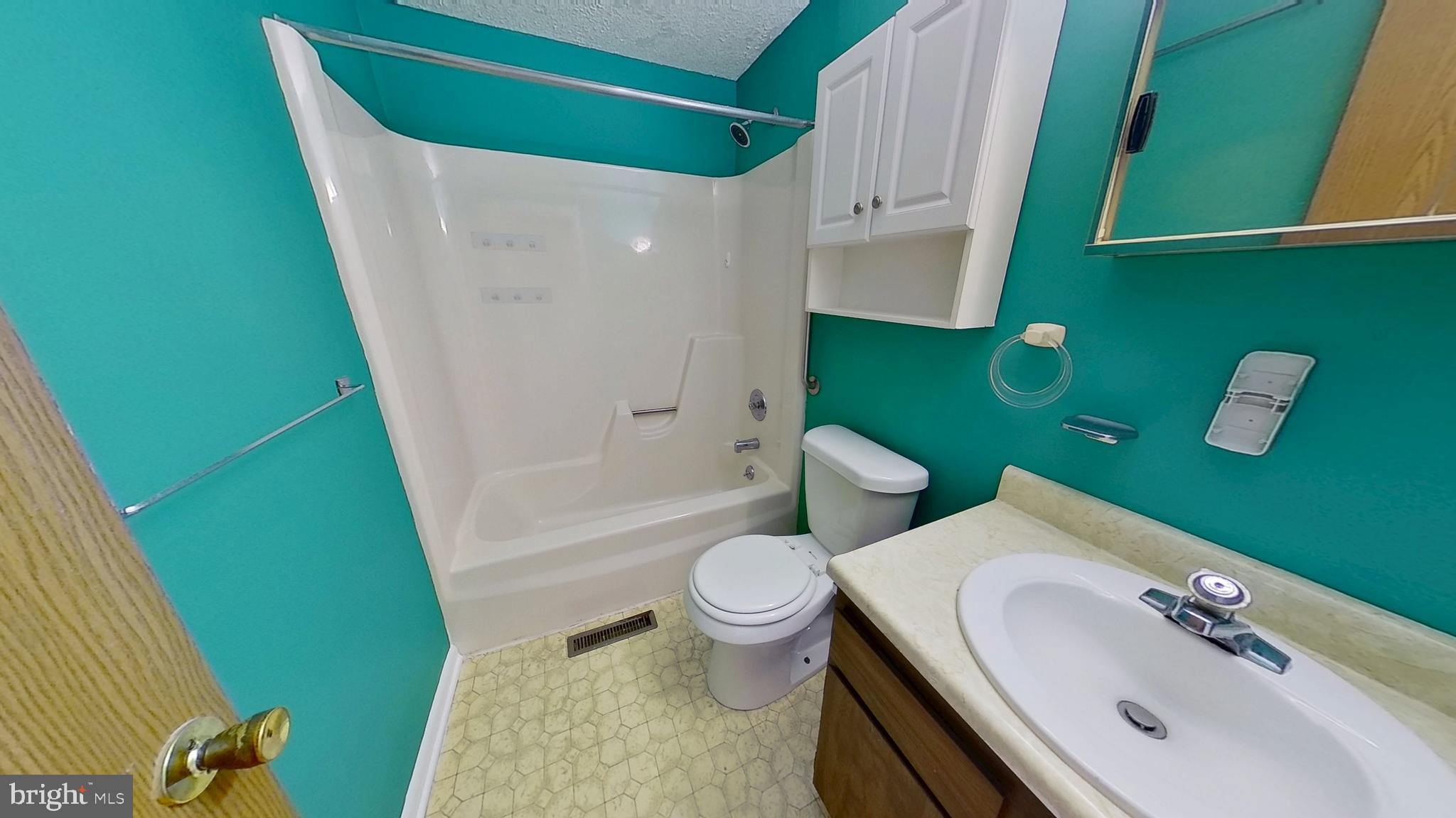 57 Beck Road York, PA 17403 - Photo 6 of 8 a bathroom with a sink and toilet