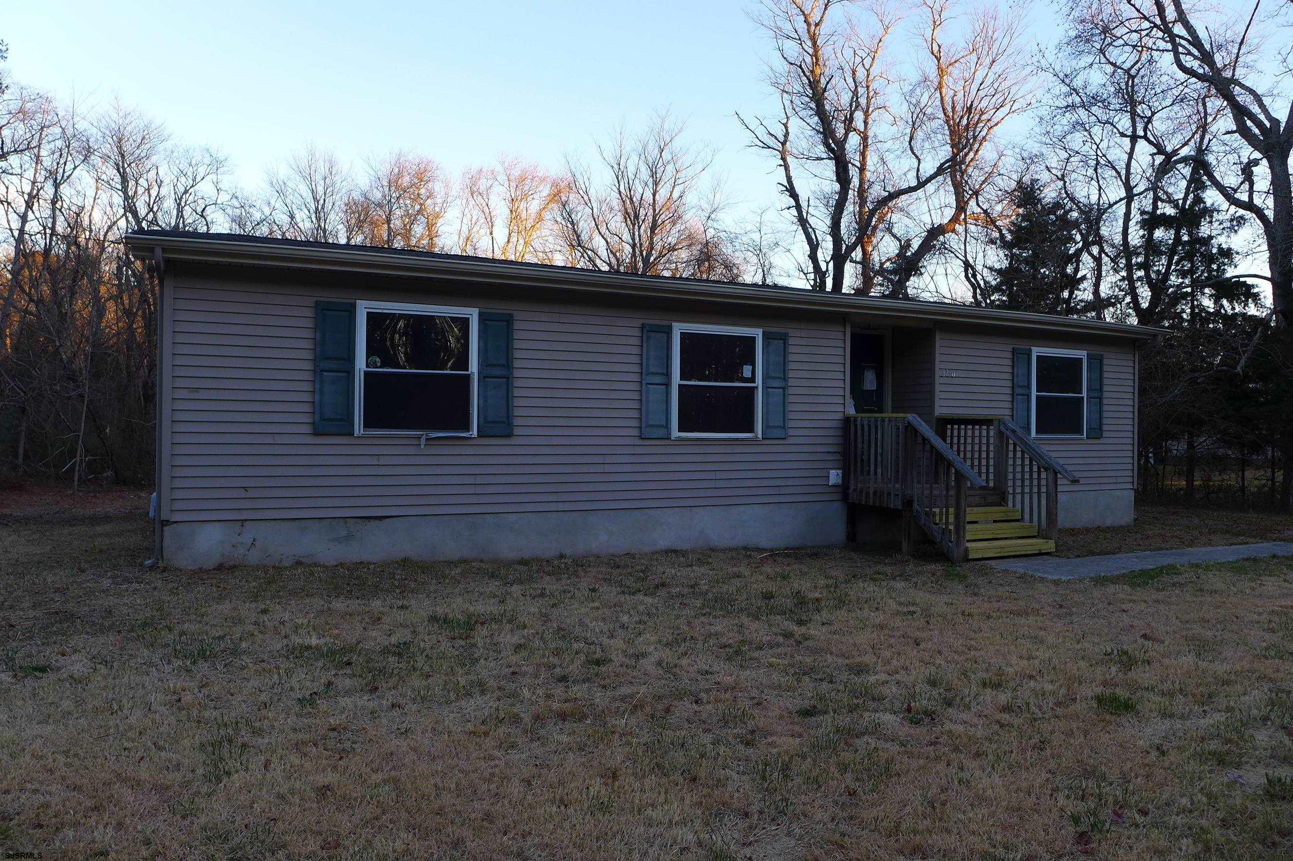 8730 Ferry Road Millville, NJ 08332 - Photo 2 of 14 a view of a house with a yard