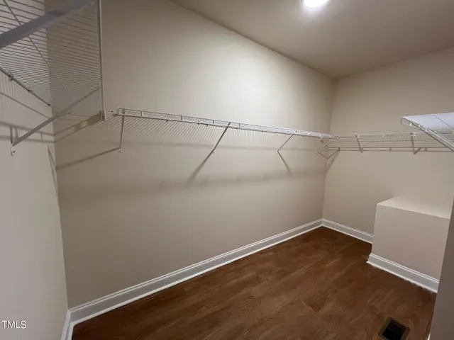 a view of a room with racks on the wall