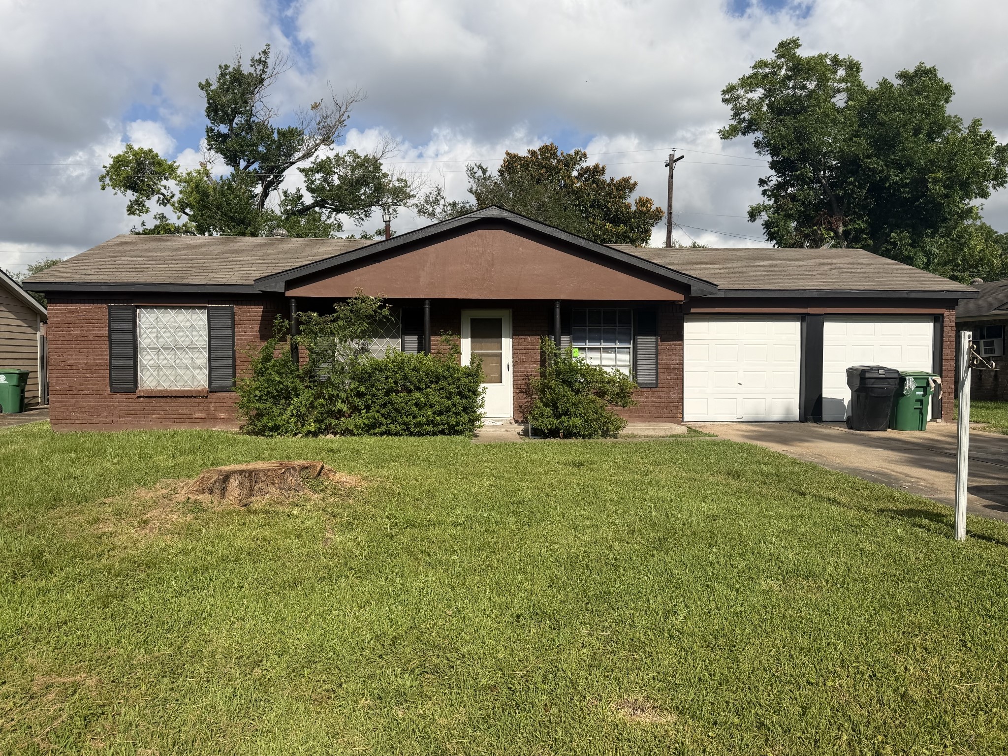 12607 Bauman Road Houston, TX 77037 - Photo 1 of 15 a house view with a garden space