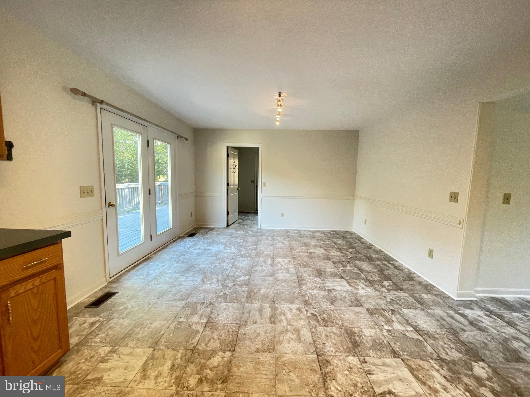 10197 Madison Drive King George, VA 22485 - Photo 7 of 19 a view of an empty room and window