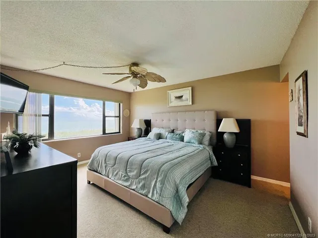 a bathroom with a sink vanity and a mirror