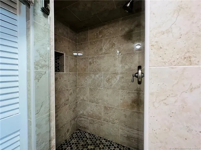 a view of a bedroom from a hallway