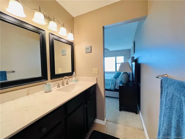 a bathroom with a toilet a sink and a shower