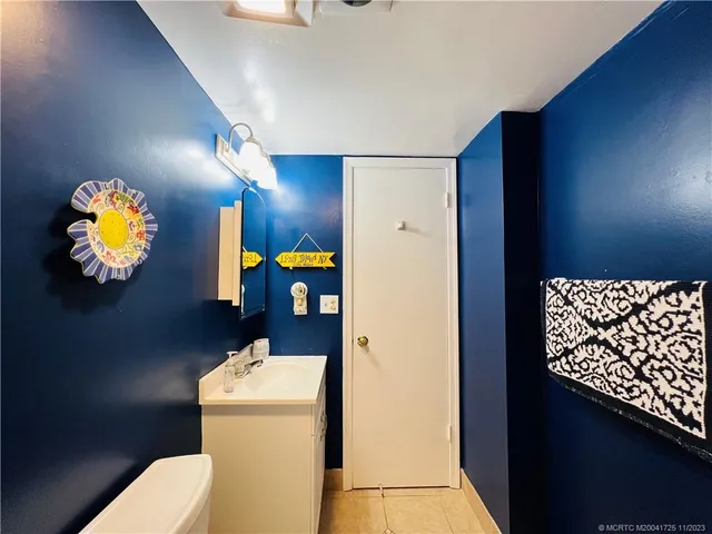 a view of a wooden deck with a yard