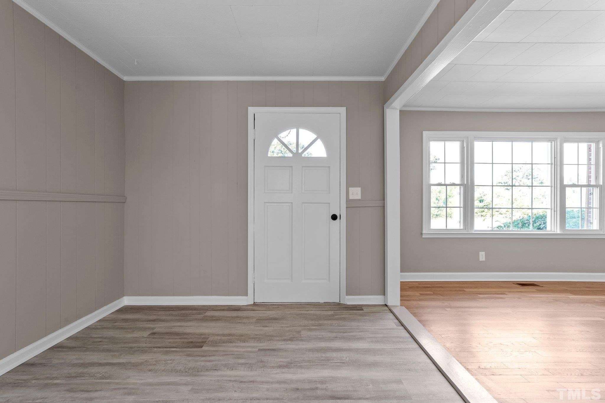 11001 Oxford Road Rougemont, NC 27572 - Photo 3 of 16 a view of empty room with wooden floor and fan