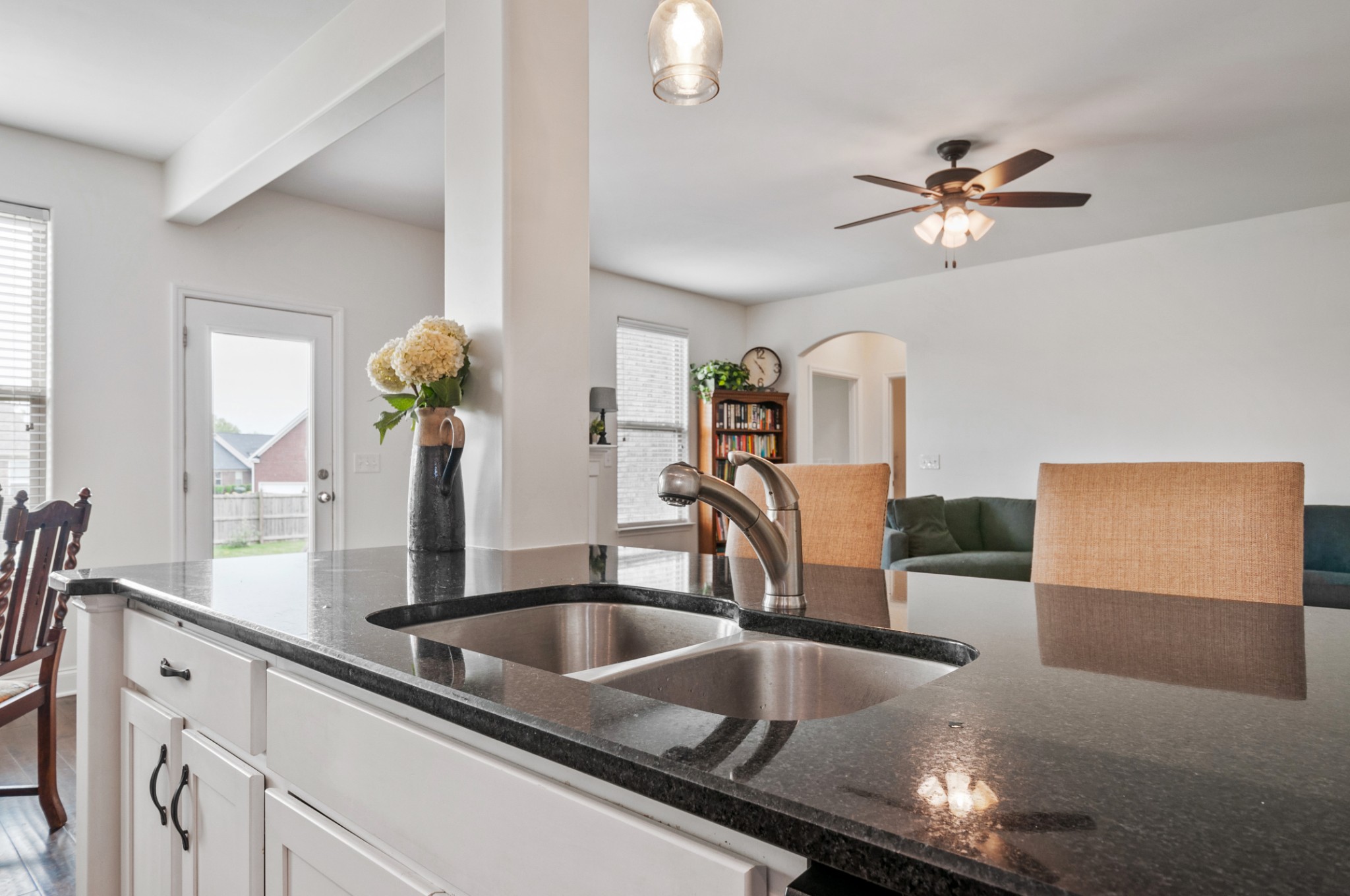 3056 Everleigh Place Spring Hill, TN 37174 - Photo 15 of 43 a kitchen with granite countertop a sink and a granite top