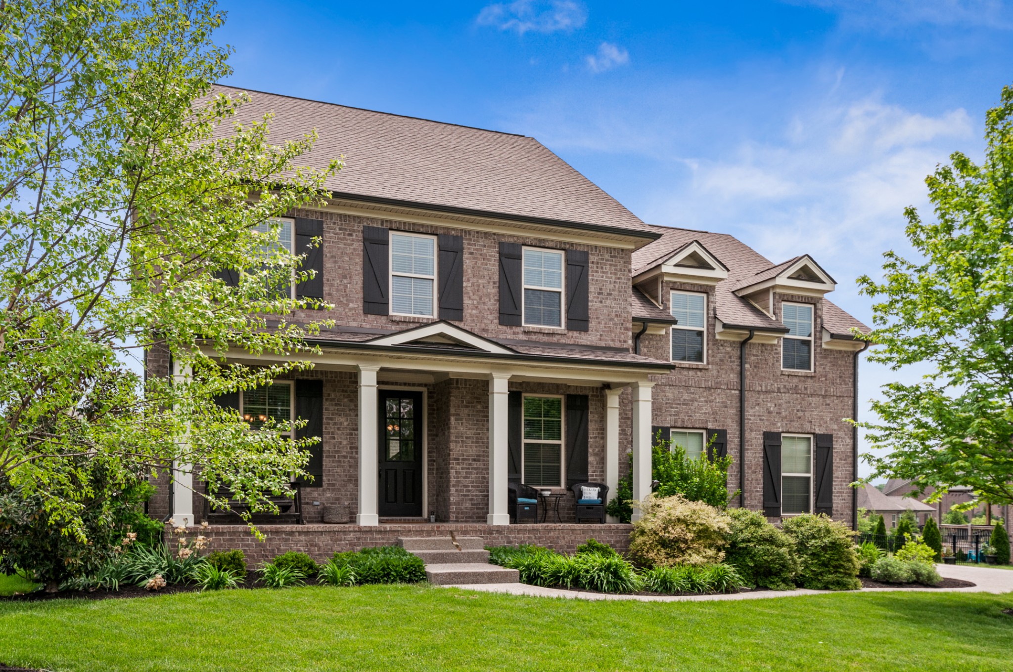 3056 Everleigh Place Spring Hill, TN 37174 - Photo 2 of 43 a front view of a house with a yard