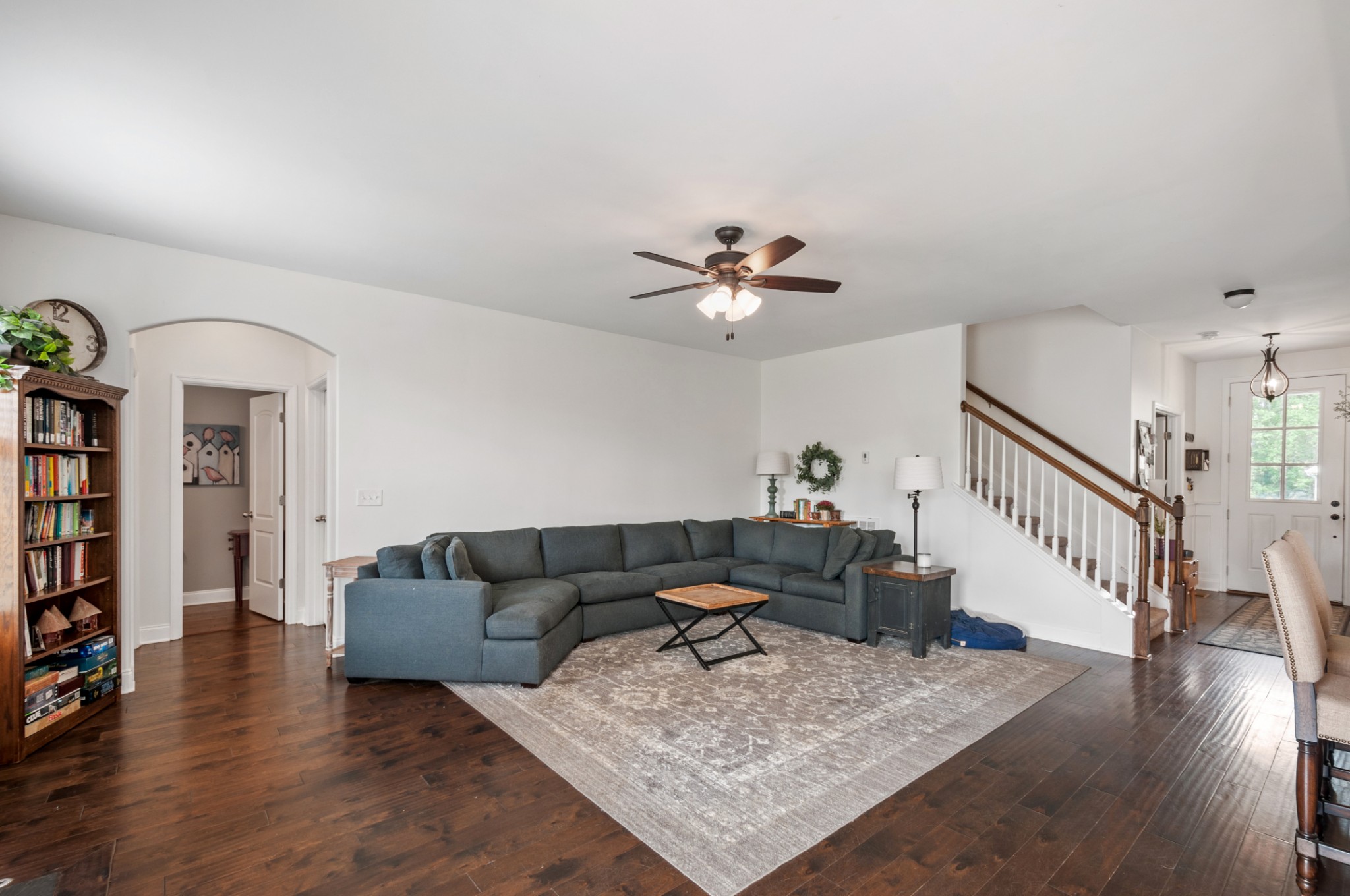 3056 Everleigh Place Spring Hill, TN 37174 - Photo 21 of 43 a living room with furniture and wooden floor