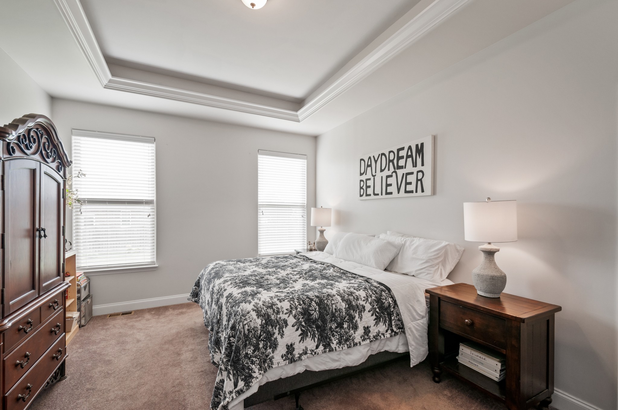 3056 Everleigh Place Spring Hill, TN 37174 - Photo 22 of 43 a bedroom with a bed a window and dresser