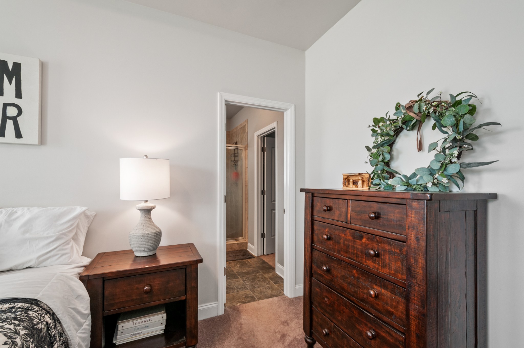 3056 Everleigh Place Spring Hill, TN 37174 - Photo 23 of 43 a bedroom with a bed and a dresser
