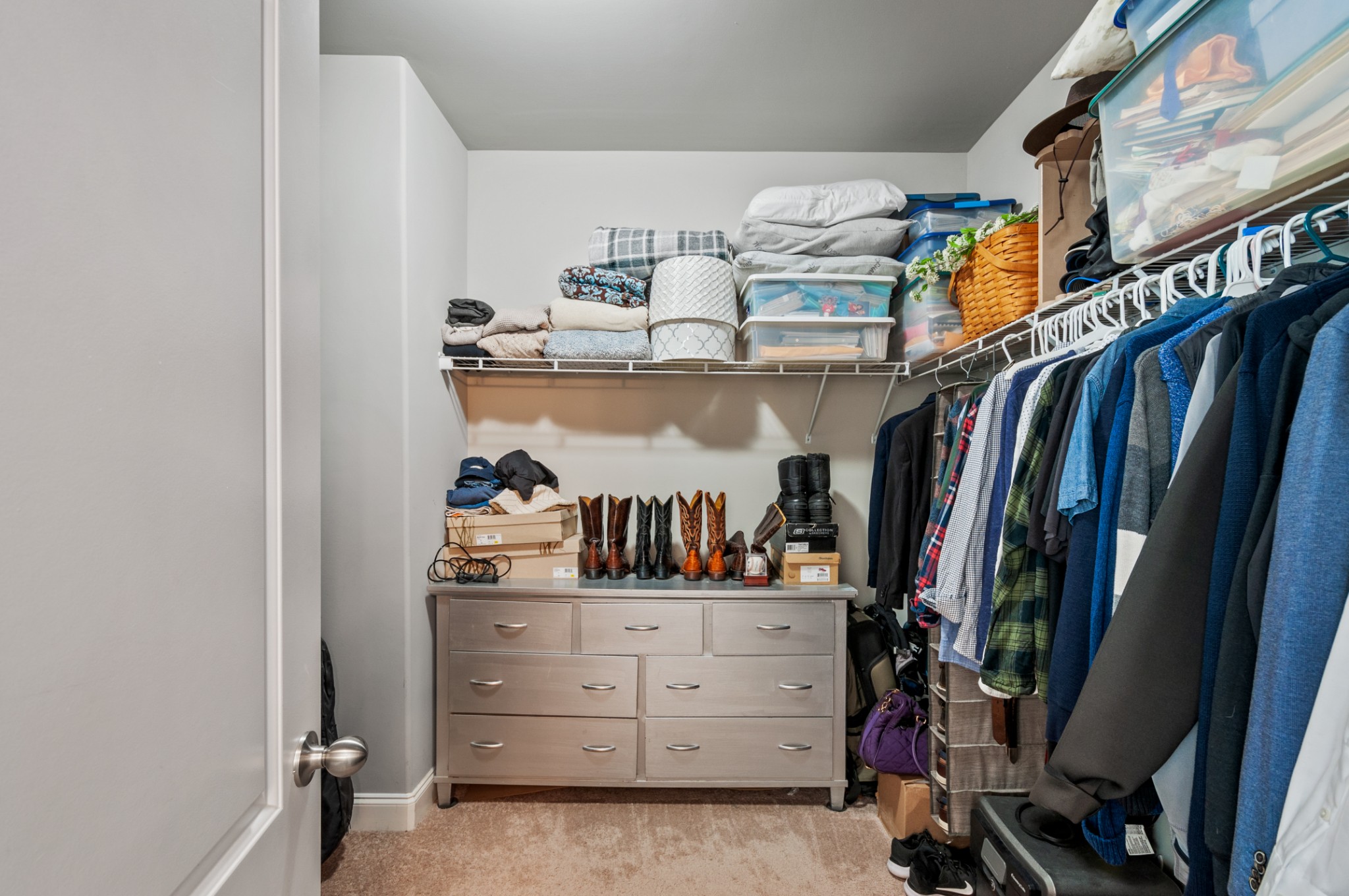 3056 Everleigh Place Spring Hill, TN 37174 - Photo 26 of 43 a view of walk in closet with clothes and shoes