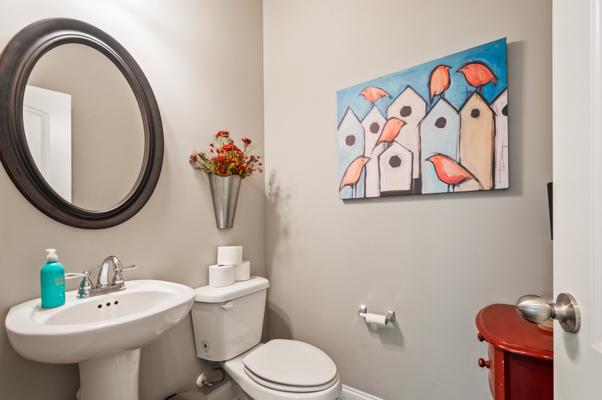 3056 Everleigh Place Spring Hill, TN 37174 - Photo 27 of 43 a bathroom with a toilet sink and mirror