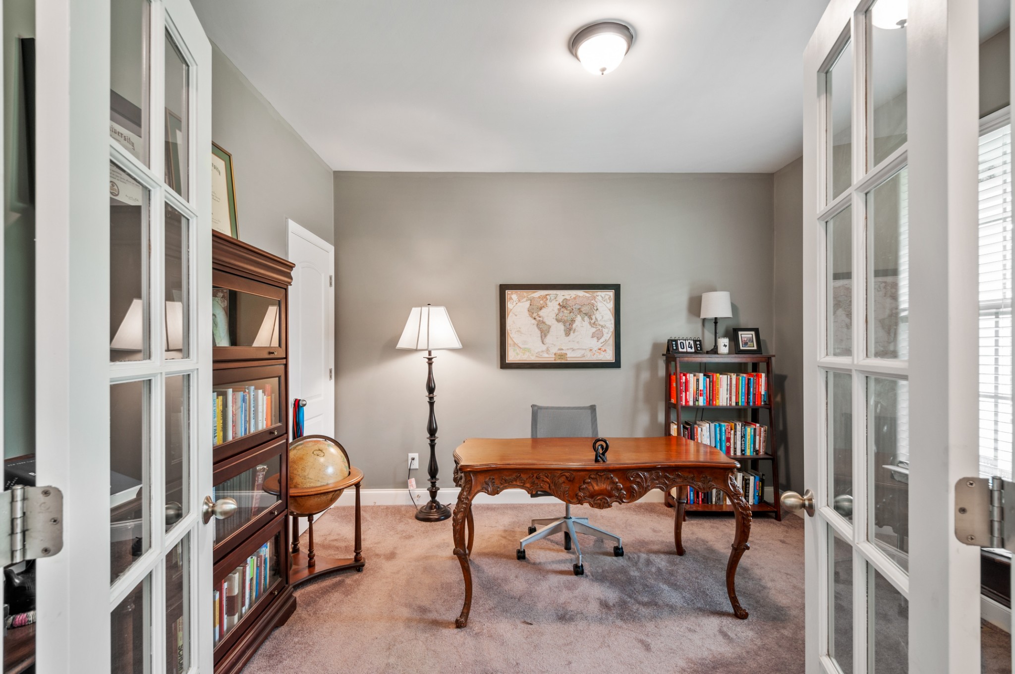 3056 Everleigh Place Spring Hill, TN 37174 - Photo 5 of 43 a living room with furniture piano and a window
