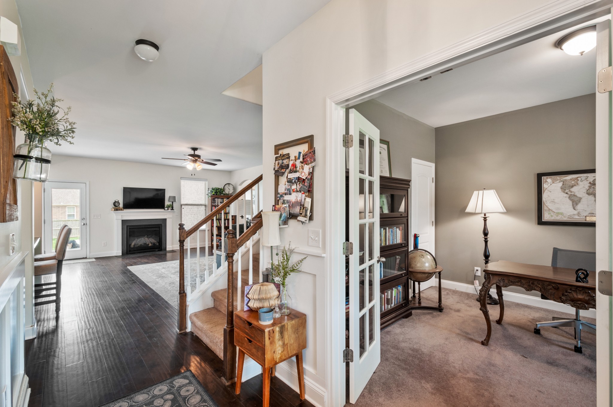 3056 Everleigh Place Spring Hill, TN 37174 - Photo 8 of 43 a living room with furniture and a wooden floor