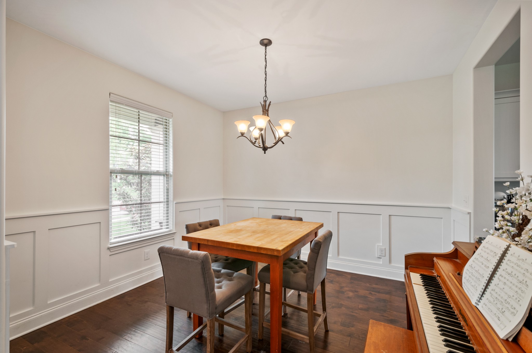 3056 Everleigh Place Spring Hill, TN 37174 - Photo 9 of 43 a view of a dining room with furniture window and wooden floor