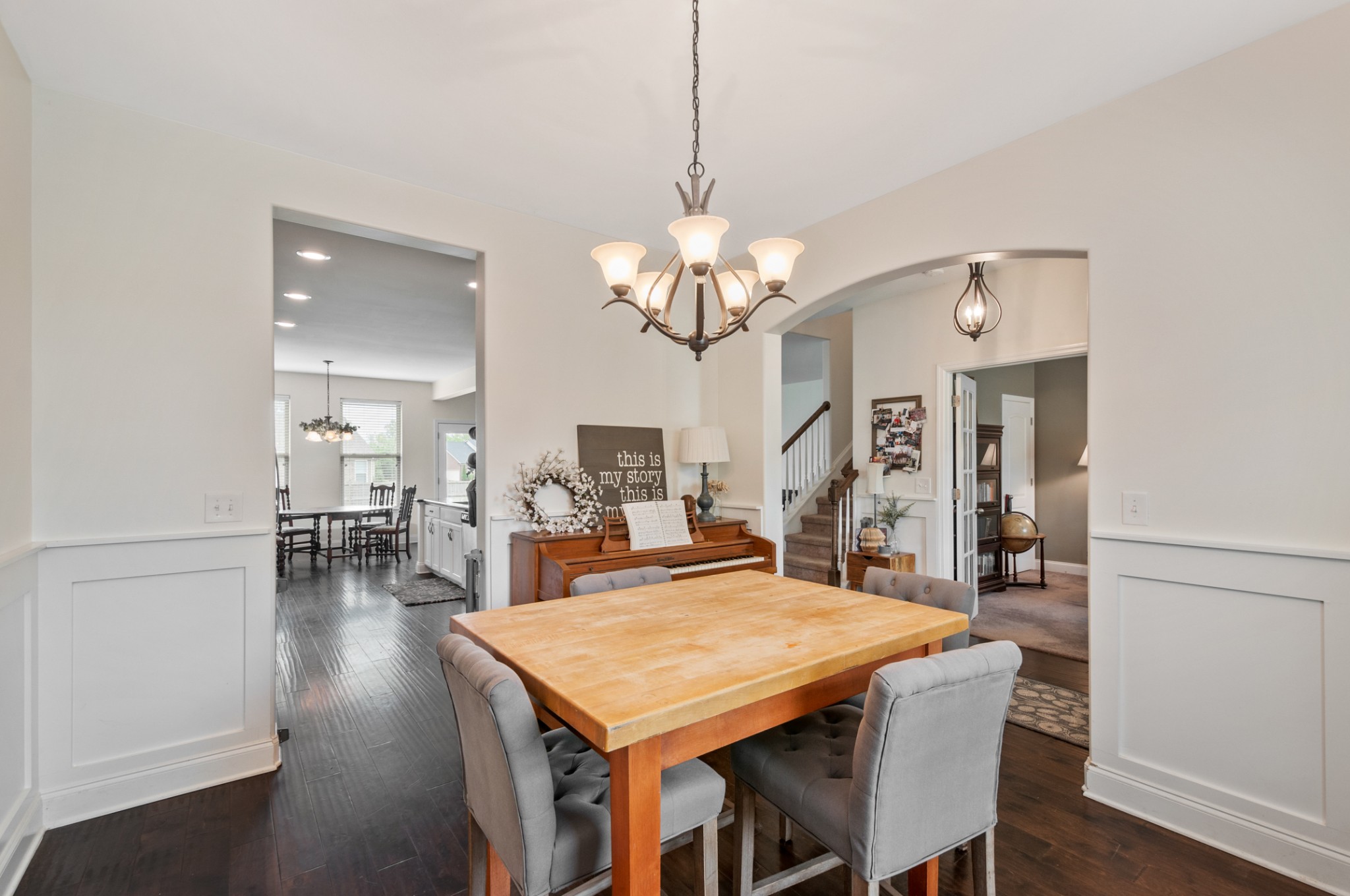 3056 Everleigh Place Spring Hill, TN 37174 - Photo 10 of 43 a view of a dining room with furniture and wooden floor
