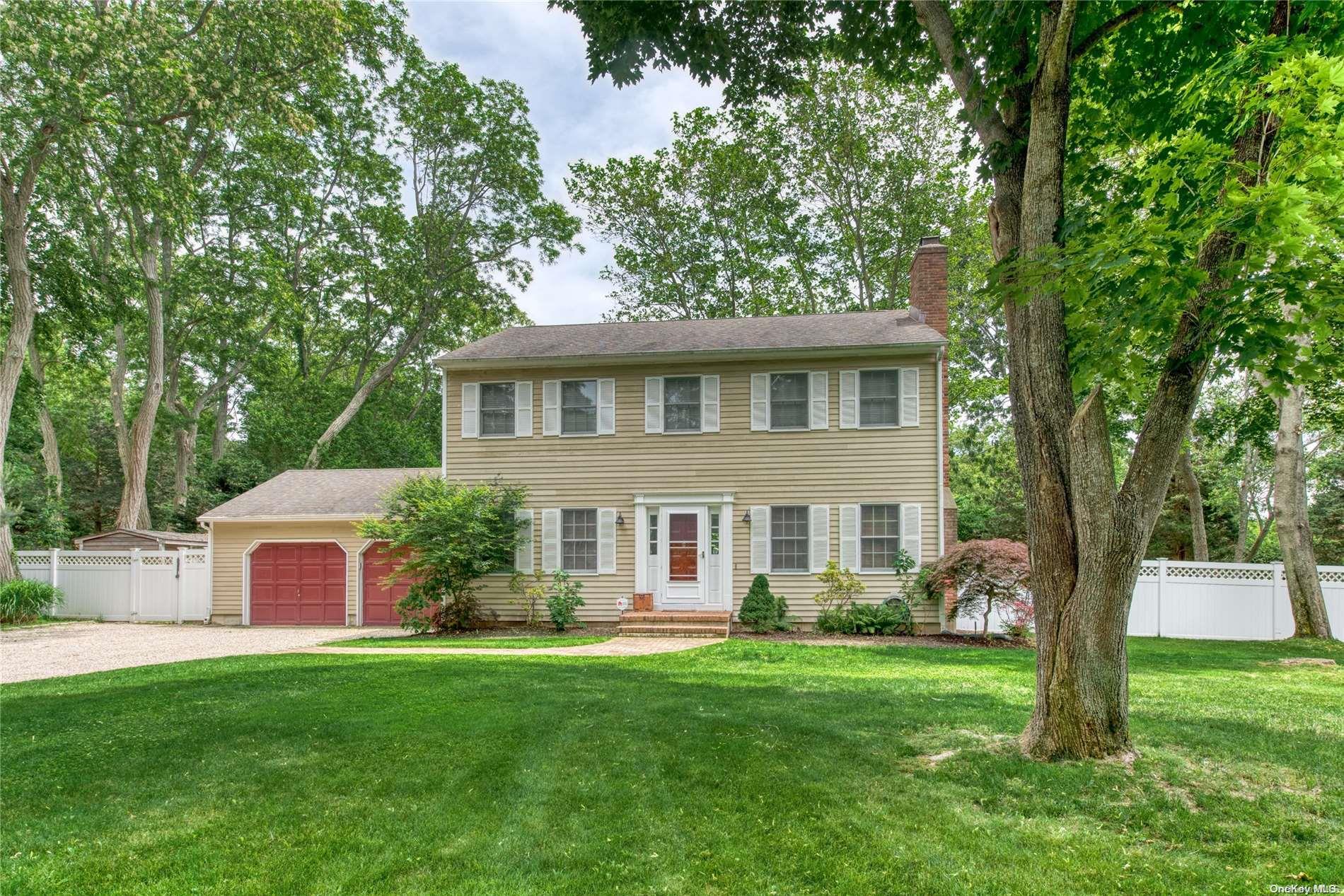 430 Pine Tree Road Cutchogue, NY 11935 - Photo 1 of 1 a front view of a house with a yard