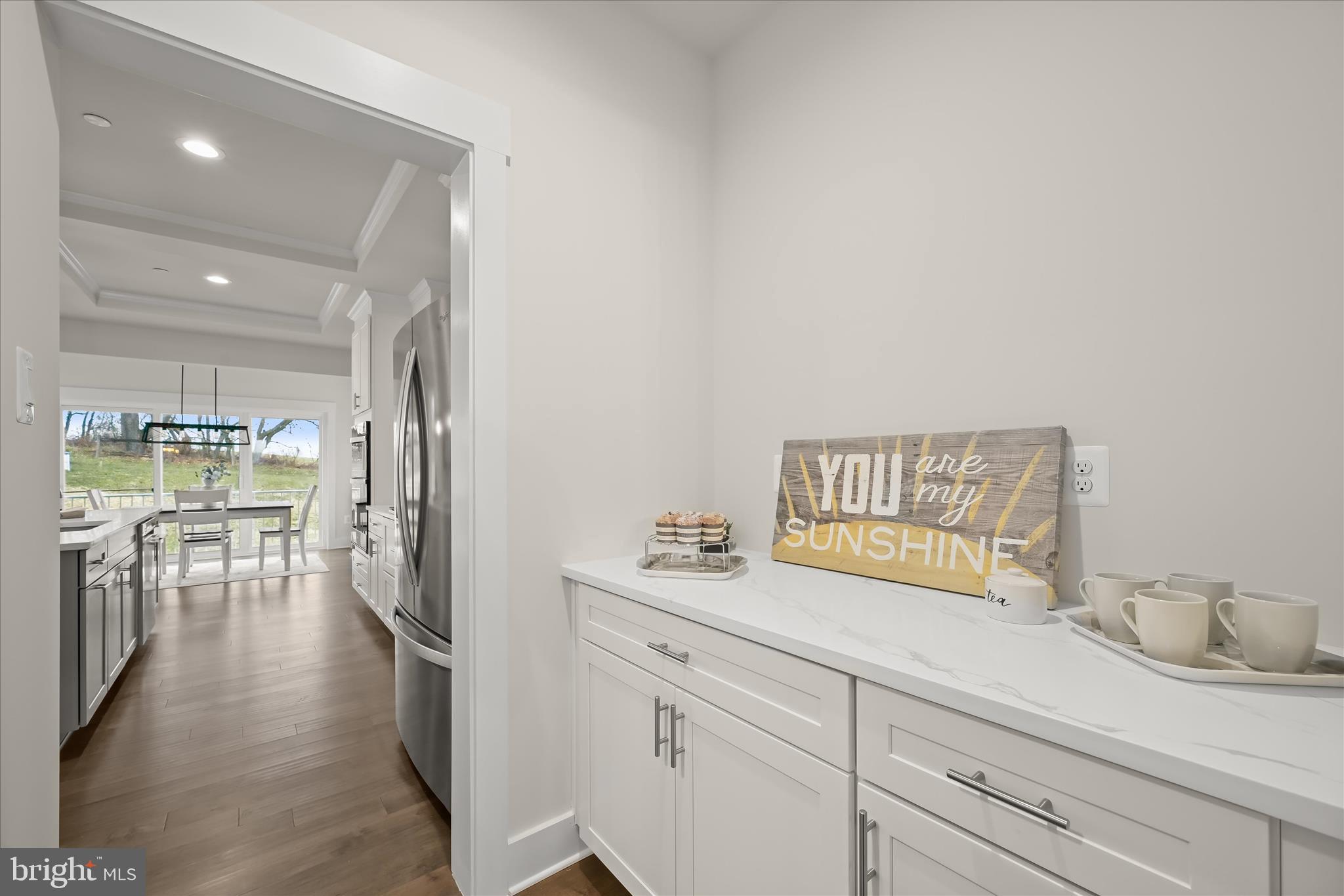 618 Deer Park Road Westminster, MD 21157 - Photo 11 of 57 a spacious bathroom with a granite countertop sink and a mirror