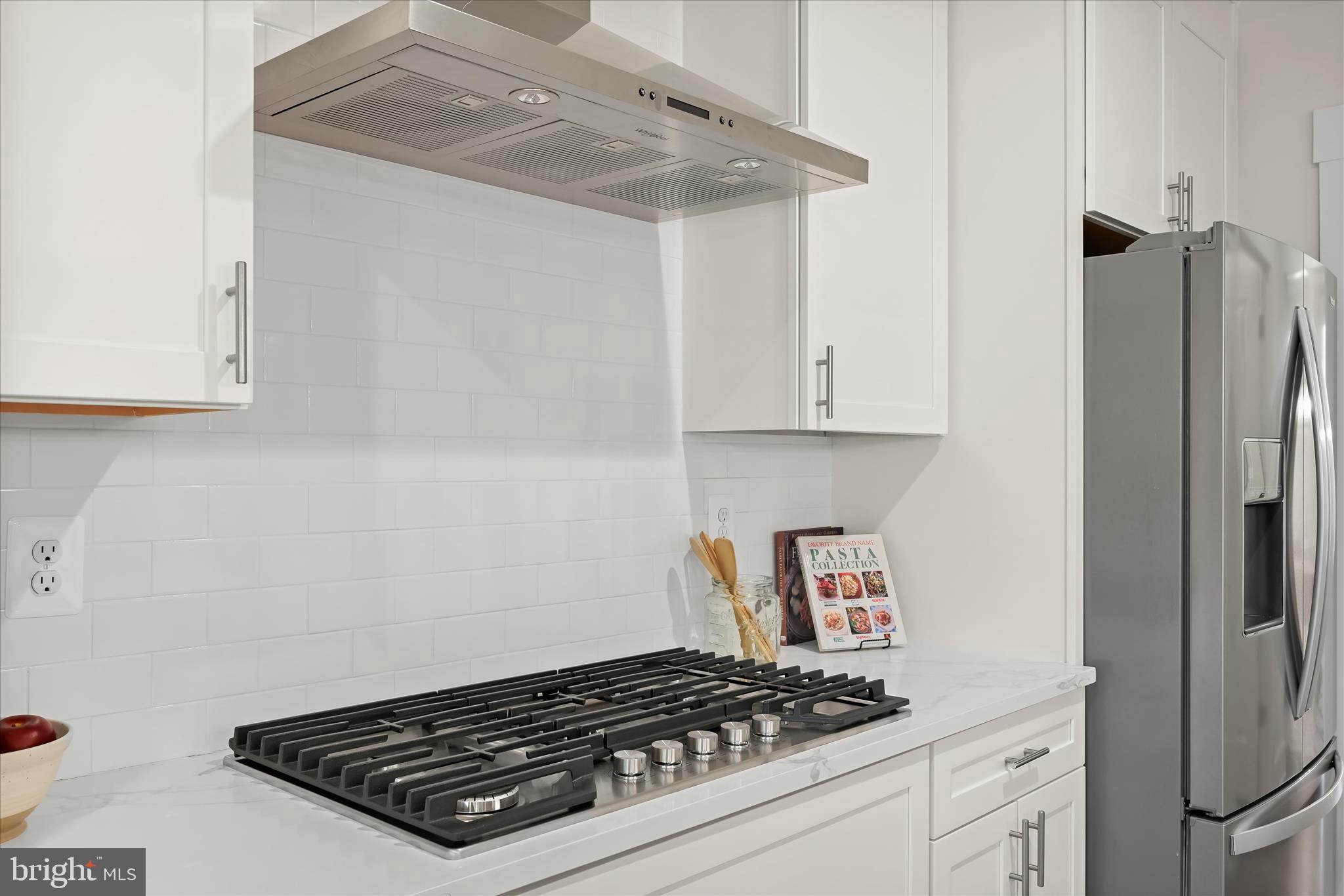 618 Deer Park Road Westminster, MD 21157 - Photo 16 of 57 a kitchen with stainless steel appliances a refrigerator and a stove