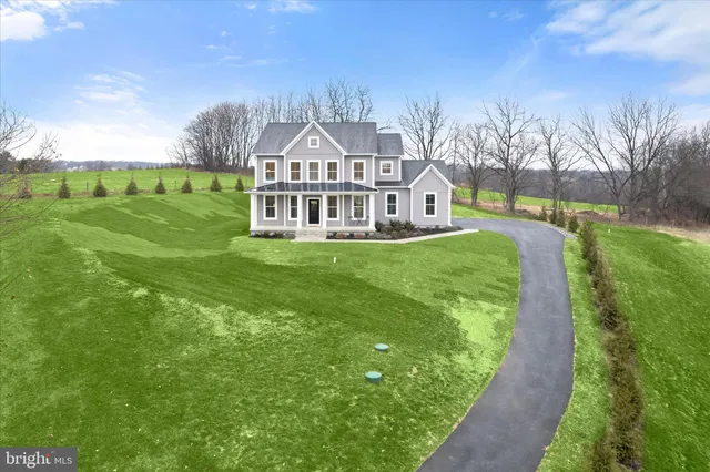 a view of a house with a big yard