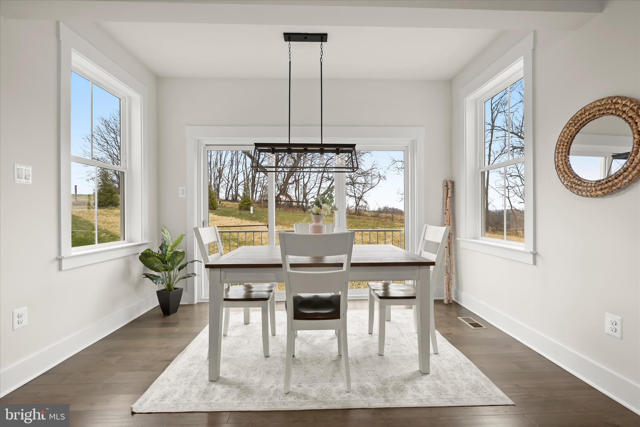 618 Deer Park Road Westminster, MD 21157 - Photo 21 of 57 a view of a dining room with furniture window and wooden floor