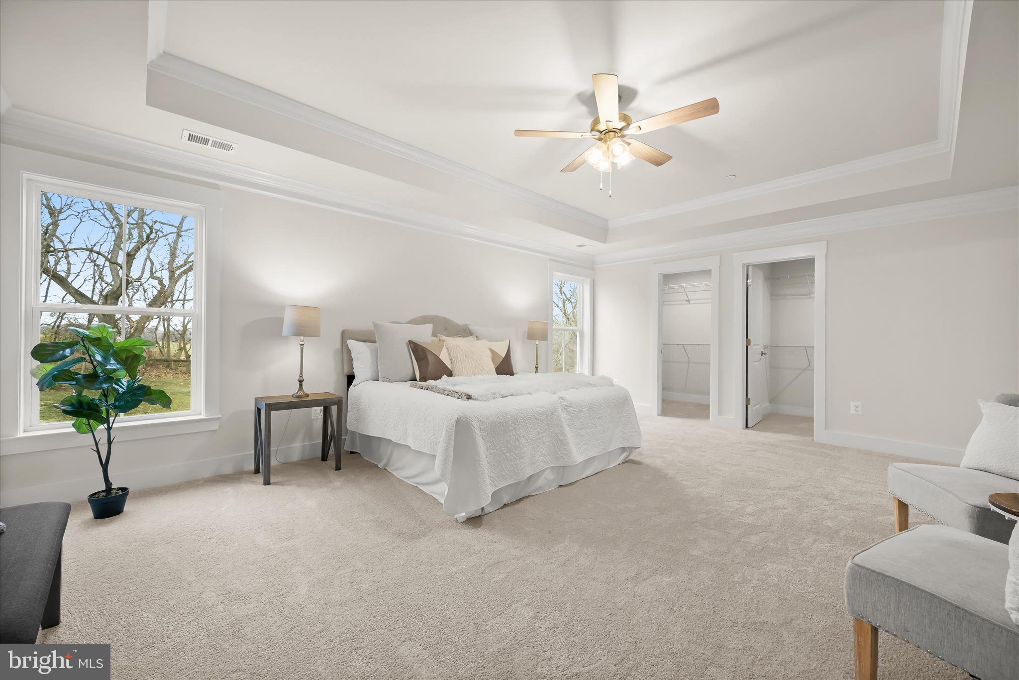 618 Deer Park Road Westminster, MD 21157 - Photo 29 of 57 a bedroom with a bed and a chandelier