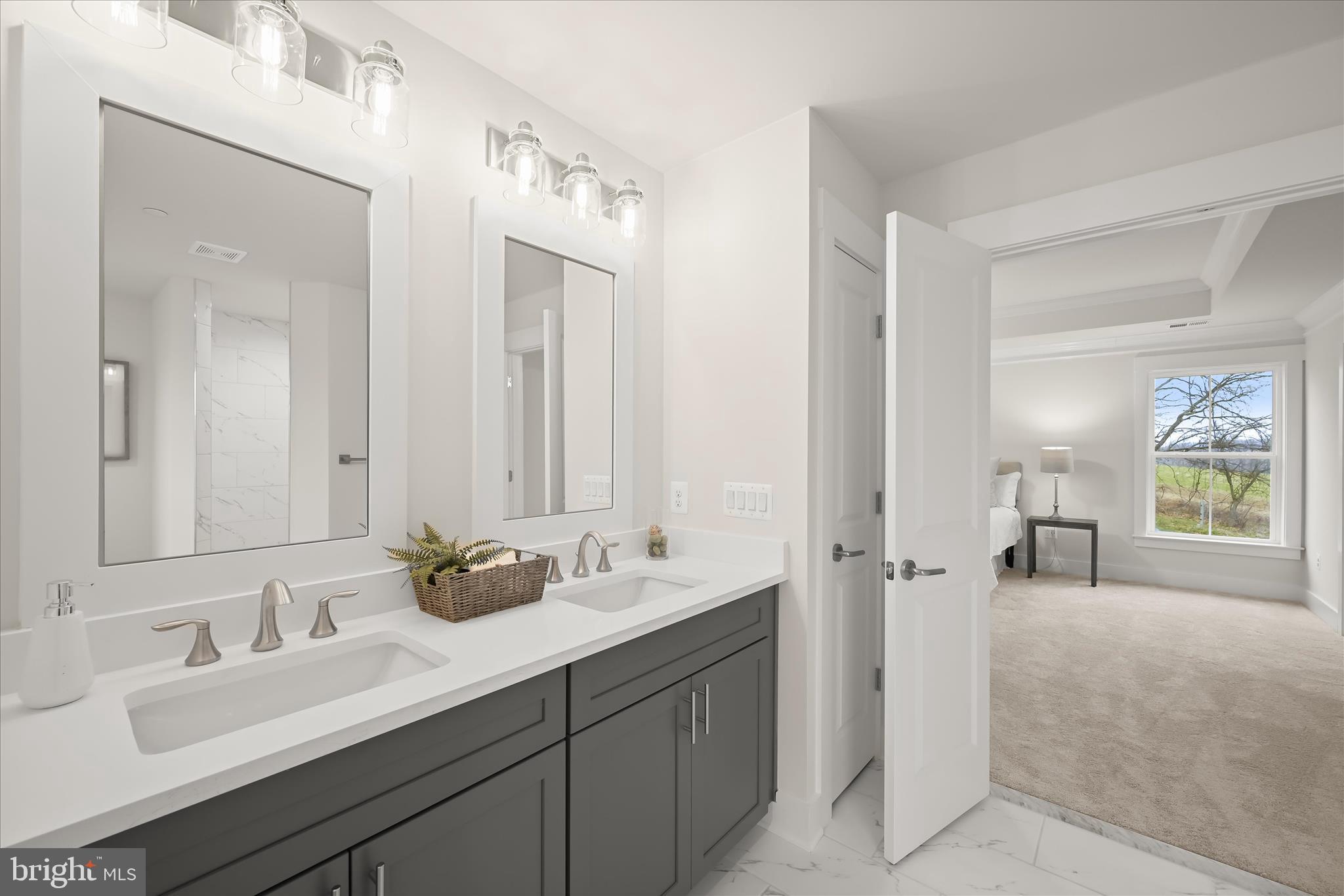 618 Deer Park Road Westminster, MD 21157 - Photo 32 of 57 a en suite bathroom with double sink and a mirror