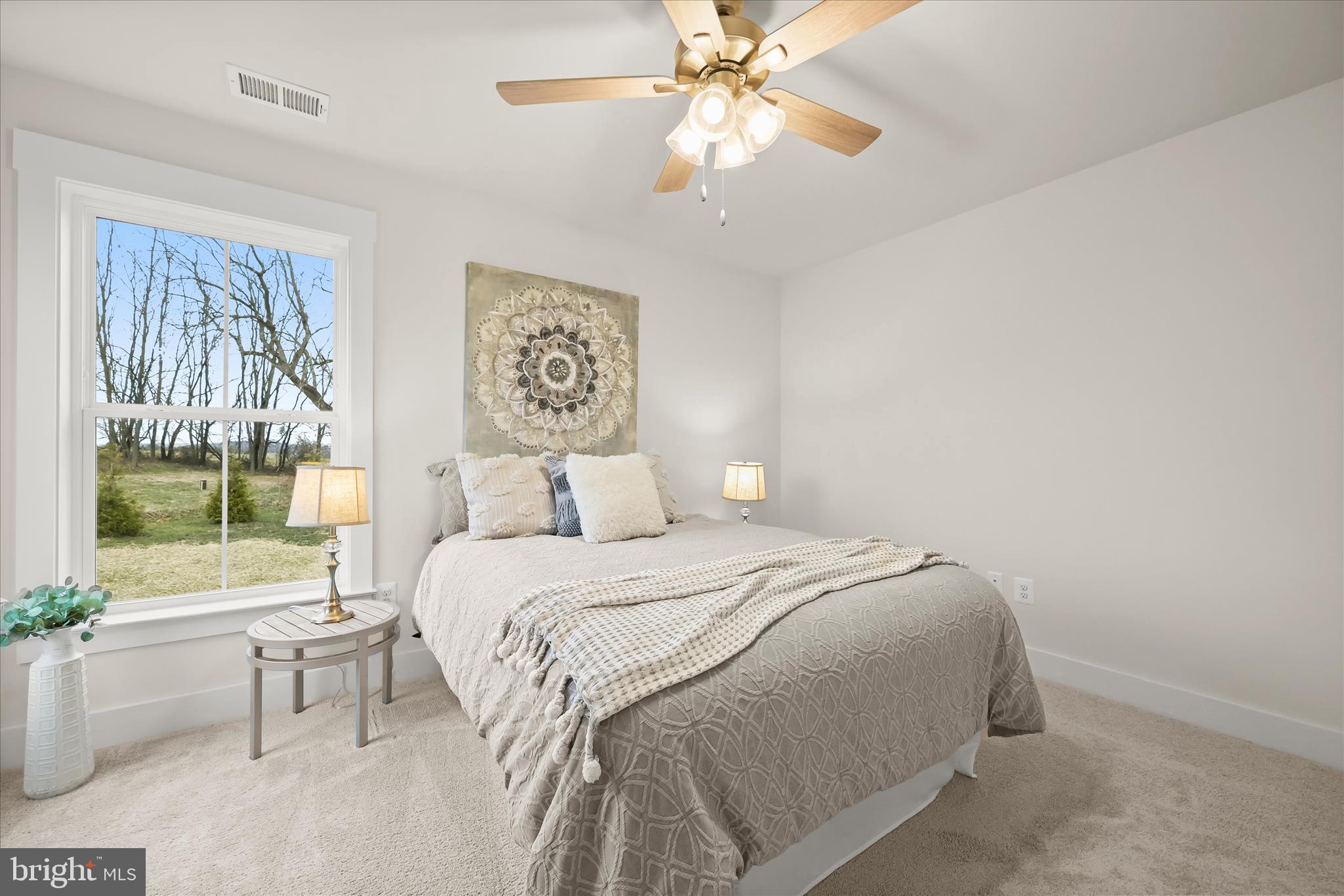 618 Deer Park Road Westminster, MD 21157 - Photo 40 of 57 a bedroom with a large bed and a window