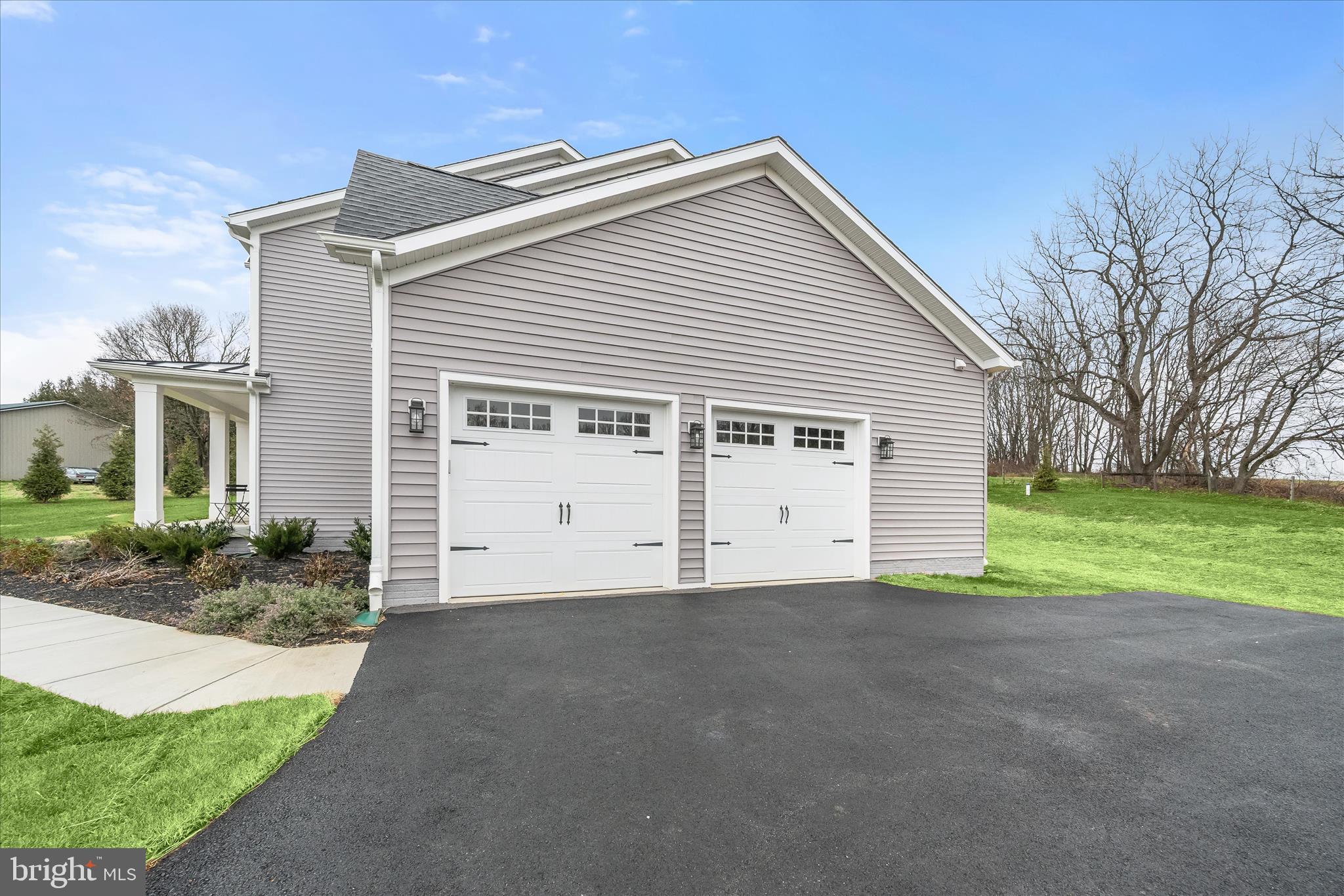 618 Deer Park Road Westminster, MD 21157 - Photo 50 of 57 a view of a house with a yard